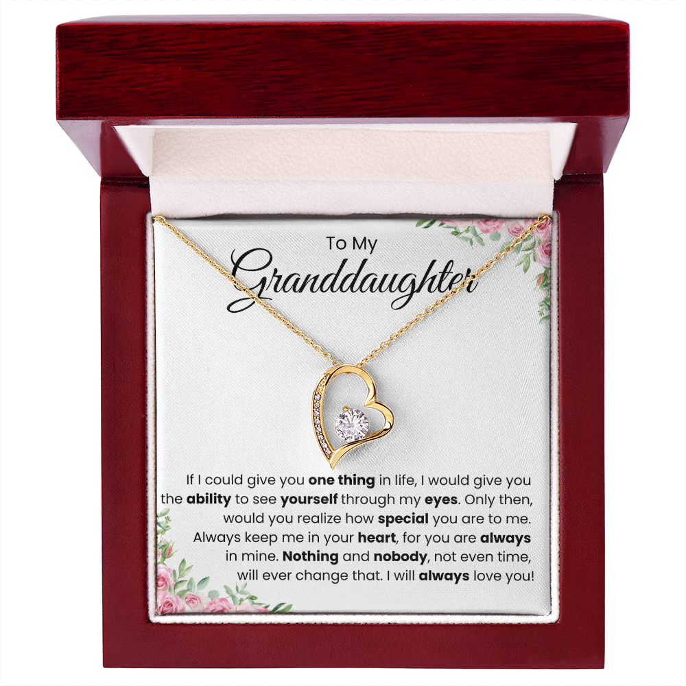 To My Granddaughter keepsake necklace, held in hand to show its scale | Evergreen Keepsakes